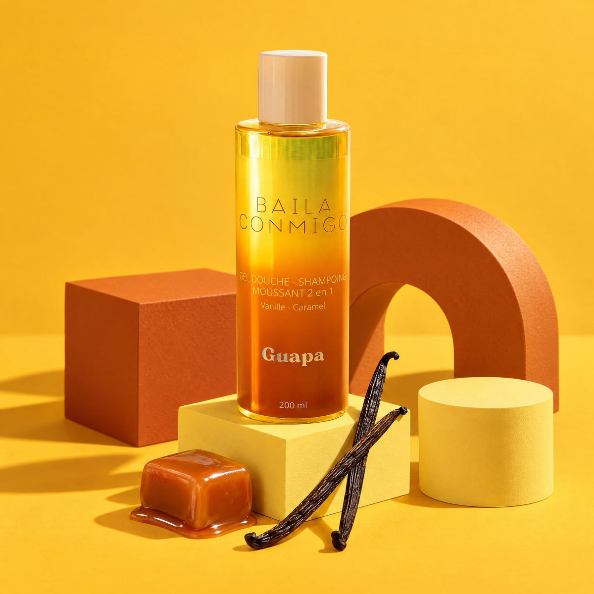 Gel douche shampoing 2 en 1 Vanille Caramel GUAPA 200 ml sur blocs colorés jaune et caramel